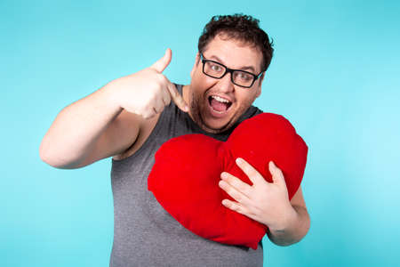 Funny fat man wakes up in the morning.の写真素材