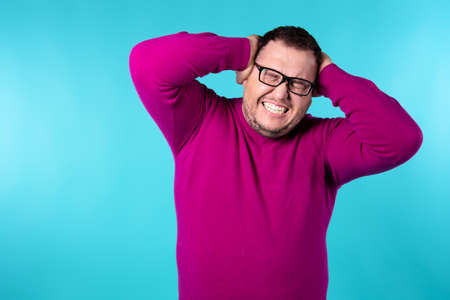 Adult attractive man on a colored background. Business and work.の写真素材