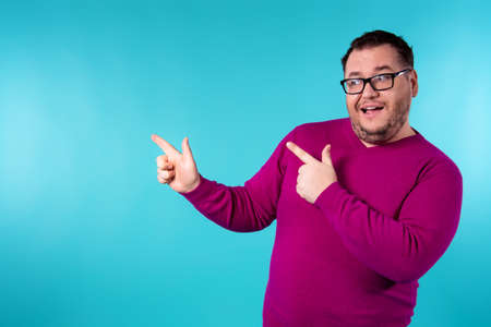 Adult attractive man on a colored background. Business and work.の写真素材