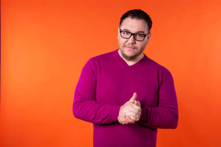 Adult attractive man on a colored background. Business and work.の写真素材