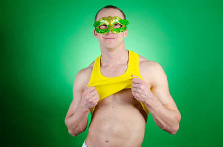 Carnival. Holidays and weekends. Young sexy man.の写真素材