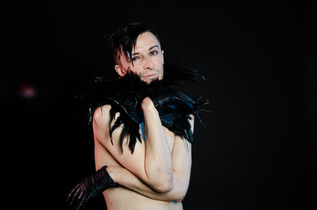 Halloween and art. An attractive guy. Black background.の写真素材