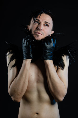 Halloween and art. An attractive guy. Black background.の写真素材