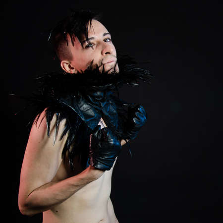 Halloween and art. An attractive guy. Black background.の写真素材