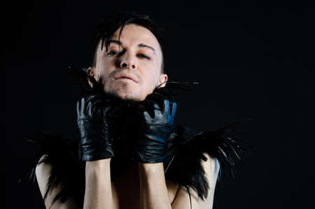 Halloween and art. An attractive guy. Black background.の写真素材