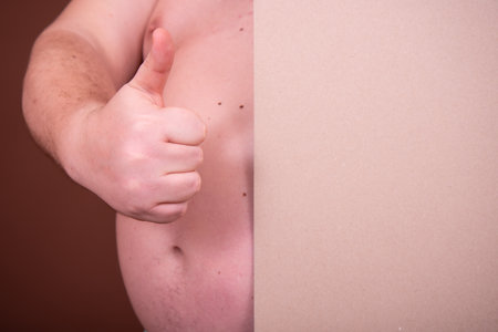 Diet and weight problem. A man with a big belly.の写真素材