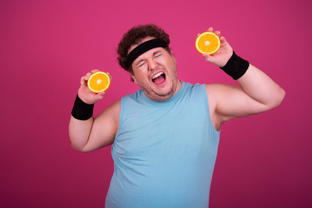 Funny fat man eats donuts. Retro style. Food and fitness.の写真素材