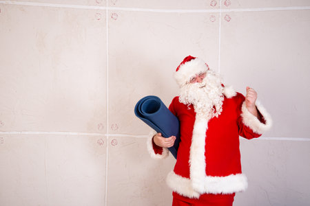 Funny fat Santa Claus and vacation.の写真素材