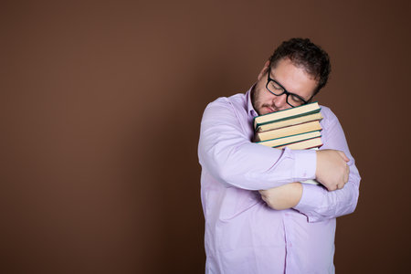 Funny man with different books.の写真素材