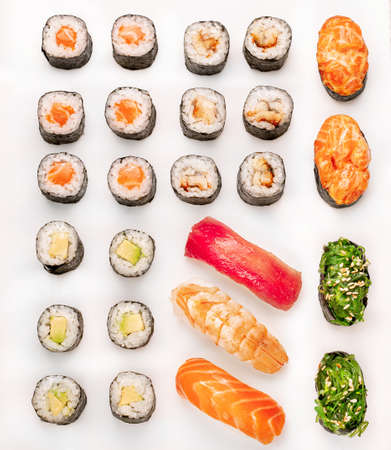 Big colorful sushi set on a white background. Top view.の写真素材