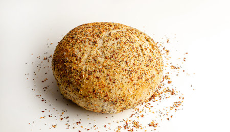 Fresh Multigrain Artisan round Bread or bun with sesame and flax seeds Isolated on White Background. Flat lay. Food concept.の写真素材