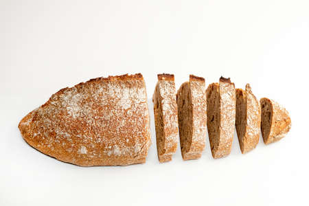 Sliced bread isolated on a white background. Bread slices viewed from above. Top view. Food abstractionsの写真素材