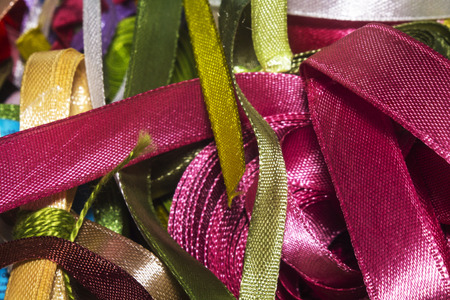 Fabric tapes of different colors for crafting.の写真素材