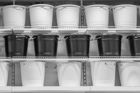 Group of buckets on shelves.の写真素材