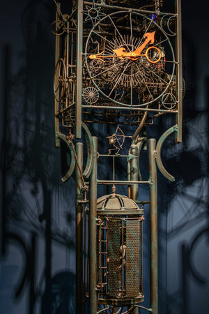 Spotlight clock system with metallic bars. Beautiful image with huge metallic clock mechanism and...