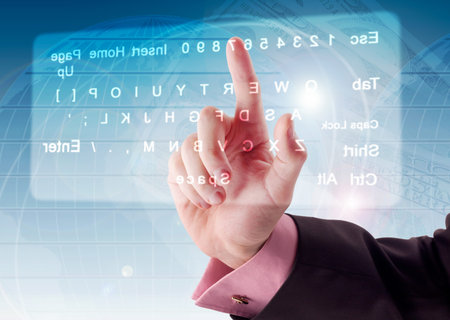 Hand pushing a button on a touch screen