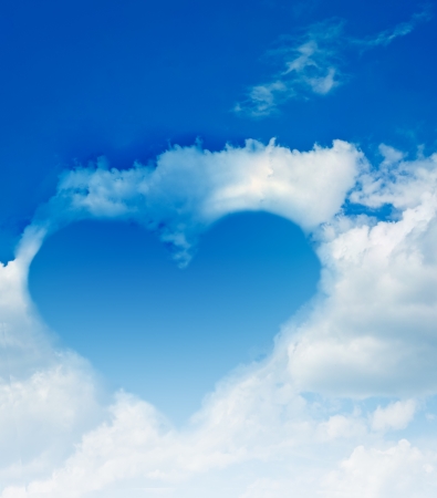 Heart made from cloud in the blue skyの写真素材