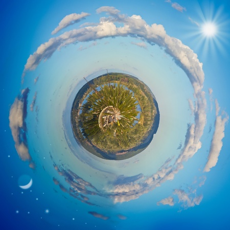 Little planet panorama with day and nightの写真素材