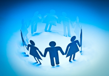 Group of paper doll people holding hands. Social network conceptの写真素材