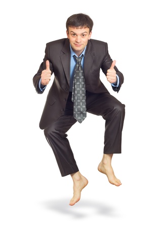 Jumping businessman isolated on white (with shadow)の写真素材