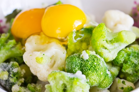 Green fresh broccoli close up with a shallow depth of fieldの写真素材