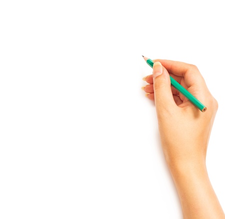 Woman's hand holding a pencil on a white white backgroundの写真素材