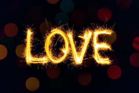 Valentines Day - Love made a sparkler on black backgroundの写真素材