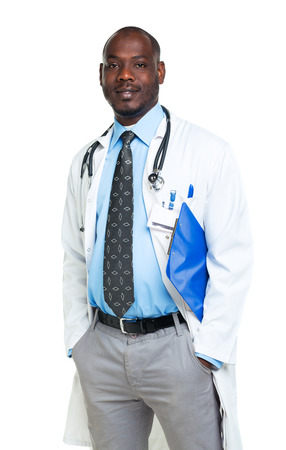 Portrait of a smiling male doctor holding a notepad on white backgroundの写真素材
