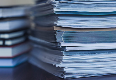 Accounting and taxes. Large pile of magazine and books closeup