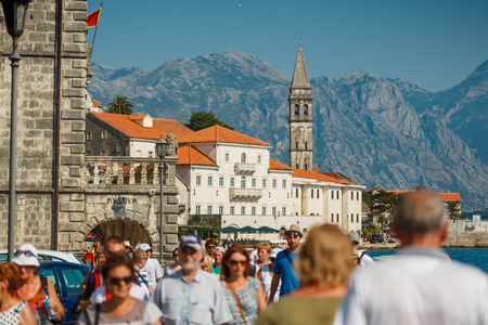 HISTORICAL CITY OF PERAST, MONTENEGRO: Tourists walk in the historical city of Perast out of focus on July 20th, 2015 in Perast Montenegroのeditorial素材