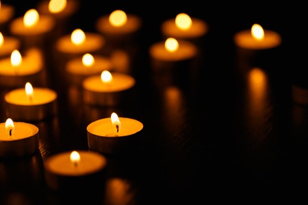 Many burning candles with shallow depth of fieldの写真素材