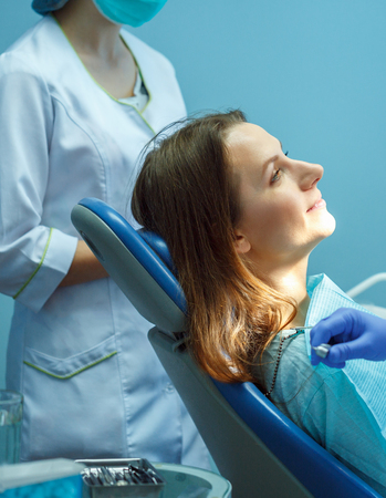 Close up woman getting a dental treatmentの写真素材