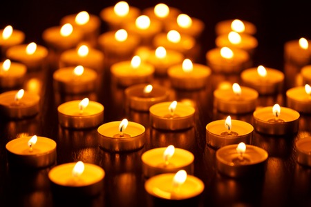 Many burning candles with shallow depth of fieldの写真素材