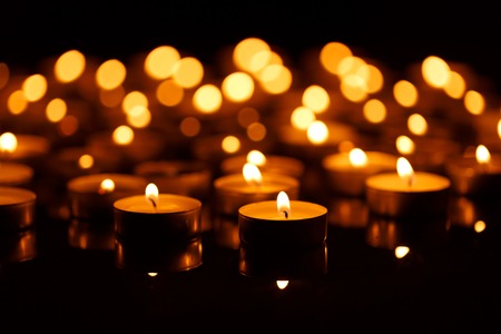 Many burning candles with shallow depth of fieldの写真素材