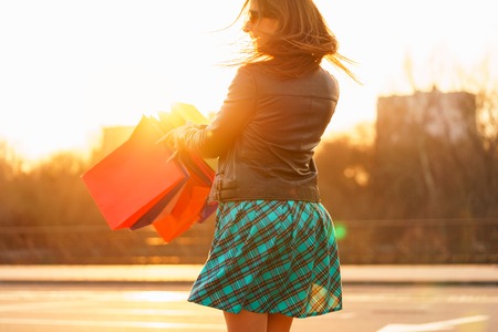 Woman holding her shopping bags in her hand - Let's go shopping conceptの写真素材