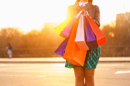 Woman holding her shopping bags in her hand - Let's go shopping conceptの写真素材