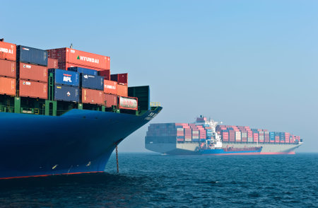 Two container ships in the harbor. Nakhodka Bay. East (Japan) Sea. 19.04.2014