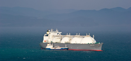 Tanker Nicholay Shalavin on raid bunkering anchored tanker Fuji LNG. Nakhodka Bay. East (Japan) Sea. 05.05.2014のeditorial素材