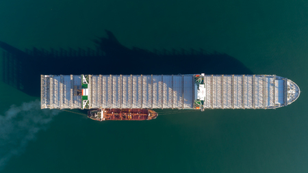 Top view of a large empty container ship and a tanker.の写真素材