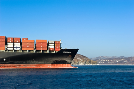 Nakhodka, Russia - February 01, 2018: The bow of a huge container ship Aristomenis at at anchored in the roads.のeditorial素材