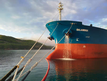 Nakhodka, Russia - May 25, 2020: The bow of the tanker Salaminia standing at the pier.のeditorial素材