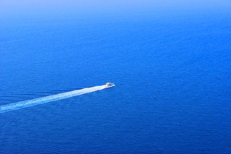 Boat sails on the sea a large panorama of the sea,luxury summer adventure, active holidays in Spainの写真素材