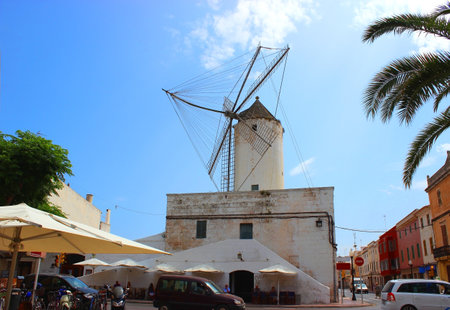 Moli des Comte - Old Windmill in Ciutadella on Menorca, Balearic Islands, Spain. the Moli dÃ¢??es Comte Asador in Ciutadella.The old windmill converted into a bar and restaurant at the town square ofの写真素材