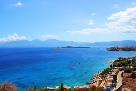 View of the sea and islands and the coast from the mountains in Greeceの写真素材