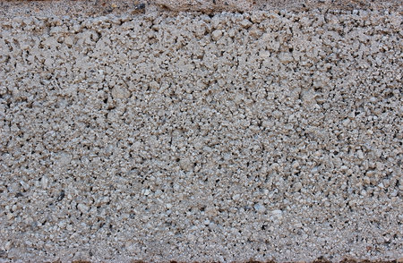 textured sandstone porous concrete wallの写真素材