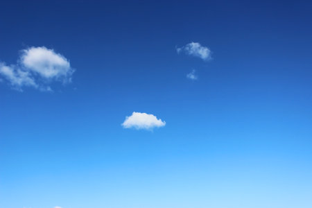 blue sky clouds, blue sky with unusual shaped clouds.の写真素材