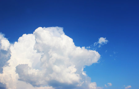 blue sky clouds, blue sky with unusual shaped clouds.の写真素材