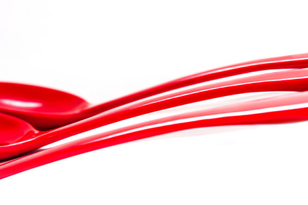 Plastic kitchen utensils on isolated on whiteの写真素材