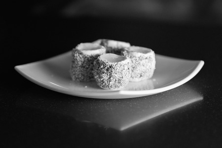 Cakes on a plate black and white filterの写真素材