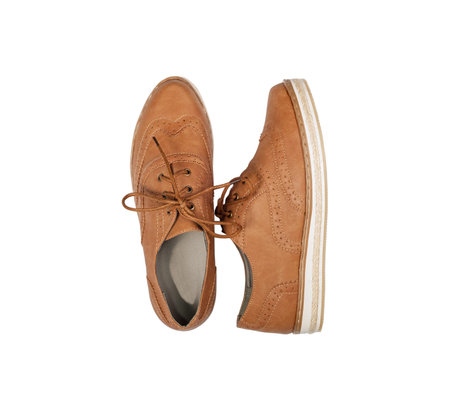 Brown boots shoes on white backgroundの写真素材